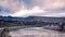 Timelapse of clouds and river in the evening at Yarchen Gar Monastery in Sichuan