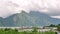 Timelapse: Clouds Running Fast over Mountain and Lake Batur. 4K. Bali island, Indonesia.