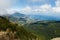 Timelapse cloudscape of Yalta city in the Ai-Petri crimean mountains. Flowing clouds above the blue sea and town. Crimea