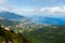 Timelapse cloudscape of Yalta city in the Ai-Petri crimean mountains. Flowing clouds above the blue sea and town. Crimea