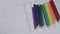 Timelapse of colored pencils that appears one by one, on white paper background with art painting. Different colors of