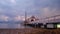 Timelapse day to night transition of floating mosque high tide to low tide.