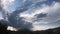 Timelapse of a dramatic cloudy sky with clouds from red to white on the sky that clears in the morning