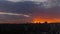 Timelapse: dramatic sky with the setting sun over the city at sunset, Istanbul