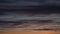 Timelapse of dramatic sunset sky panorama with burning colourful clouds background. Idyllic cloudscape backdrop at dawn. Majestic