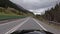 Timelapse driving on a Swiss highway in the Alps area. Mountain motorway. Driving shot, driver point of view