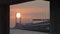 Timelapse egg yolk sunrise at center column of Penang Bridge.