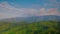 Timelapse: fast moving clouds over the mountains with green trees in Georgia