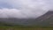 Timelapse of Fast Moving Clouds Surrounding Mountains in Iceland.