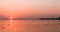 Timelapse fishing boats go and back to the port at sun down sunset