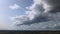 Timelapse fluffy white clouds over the forest. Countryside landscape. Aerial view. Nature concept.