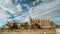 Timelapse with flying clouds over Cathedral of Palma de Mallorca and Almudaina Castle