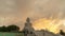 .timelapse golden cloudy at sunset behind Phuket big Buddha