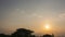 Timelapse golden sunset or morning sunrise footage. Beautiful sunbeam or rays shine in soft blue and warm orange evening sky