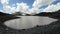 Timelapse gorge cliffs and mountain lake with moving sky shadows and clouds. North Caucasus. Russia