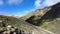 Timelapse gorge cliffs and mountain river with moving sky shadows and clouds. North Caucasus. Russia