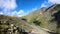 Timelapse gorge cliffs and mountain river with moving sky shadows and clouds. North Caucasus. Russia