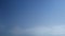 TimeLapse of Gradient & fading blue sky with wispy smoke clouds