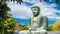 Timelapse of The Great Buddha Daibutsu, a view through the autumn leaves, is a lanmak and the sacred site is located