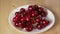 Timelapse Hands Take The Cherry Berry From The Plate