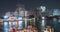 Timelapse of harbour maharaj and ferry area on Chao Phraya River. Night illumination at Bangkok, Asia, Thailand, NOV 22