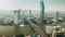 Timelapse hight view of Bangkok city with modern building,that cover with mist, and traffic
