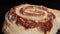 Timelapse - homemade cinnamon bun baking and rising in electric oven: close up