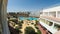 Timelapse of Hotel Resort with Blue Swimming Pool, Umbrellas and Sunbeds in Egypt