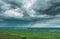 Timelapse Hyperlapse Aerial View Country wheat field. Sky With Dark Rain Clouds On Horizon Above Rural Landscape. Wind