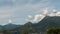 Timelapse, Lake Como on a background of villages in the mountains and blue sky with cirrus clouds quickly move across the