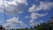 Timelapse Of Large White Clouds, Above The Rural Sky
