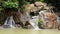 Timelapse long exposure tracking shot of Small Waterfall in beautiful rainforest at Phuket Thailand Beautiful nature landscape