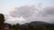 Timelapse mountain landscape with moving clouds