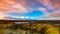 Timelapse movement of clouds across marshland