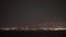 Timelapse of night getting to the coastal city