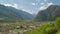 Timelapse panoramic view on town in mountains. View on town Biasca and the surrounding valley. Canton of Ticino