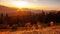 Timelapse of a partly cloudy desert sunrise viewed from a mountain pass. Shot in HDR. Includes hyperlapse panning motion