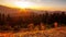 Timelapse of a partly cloudy desert sunrise viewed from a mountain pass. Shot in HDR. Includes hyperlapse panning motion