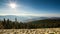 Timelapse of a partly cloudy desert sunrise viewed from a mountain pass. Shot in HDR. Includes hyperlapse panning motion