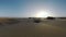 Timelapse of people in the distance walking on Maspalomas Dunes, Gran Canaria