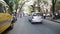 Timelapse of people and traffic on the street of Mumbai.