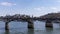 Timelapse: People walking on Pont des Arts bridge on the Seine river - Paris