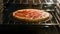 Timelapse of pepperoni pizza cooking in an oven