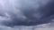 Timelapse rain falls from the clouds. Dramatic accelerated video of impending thunderstorm