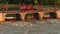 Timelapse with a river, dam, bridge, and cars. Car and pedestrian bridge in the morning.A full-flowing river with a strong current