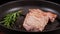 Timelapse of roasting juicy beef steak in a grill pan. Accelerated cooking at high temperatures.