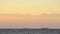 Timelapse. Silhouette of tankers of grain carriers on the skyline in the sea