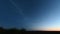 A timelapse of silvery clouds at night.