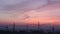 Timelapse sky sunset city cranes construction pipes smoke autumn