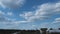 Timelapse of some clouds in the blue sky in the village wide angle of view